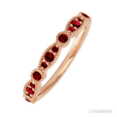 14K Rose Gold band with 7 Round and 6 Round Dark Ruby having TCW-.27