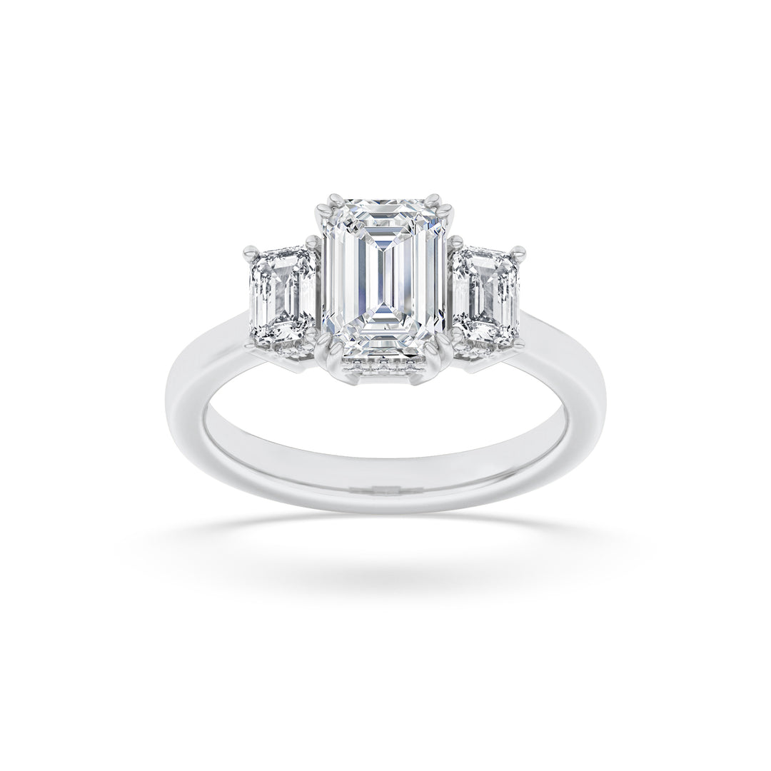 3Cttw Emerald Shaped Lab Grown Diamond (F/VS) Three Stone Accented Ring in 14K Gold