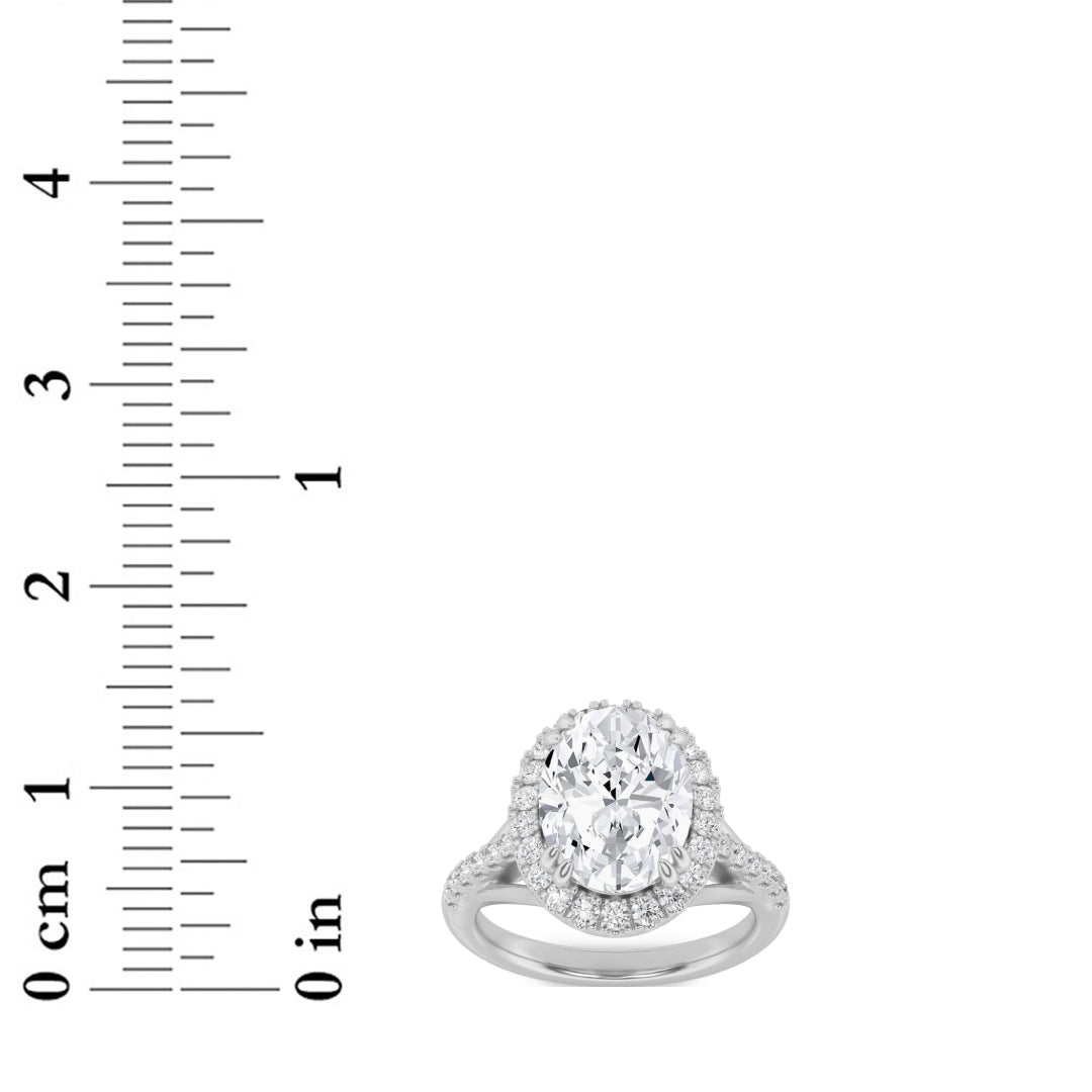 3Cttw Oval Shaped Lab Grown Diamond (F/VS) Halo Accented Engagement Ring in 14K Gold