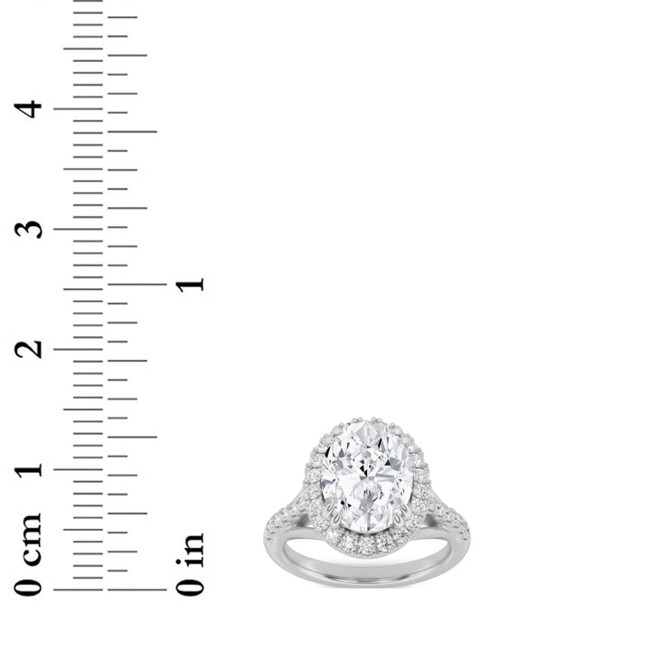 3Cttw Oval Shaped Lab Grown Diamond (F/VS) Halo Accented Engagement Ring in 14K Gold