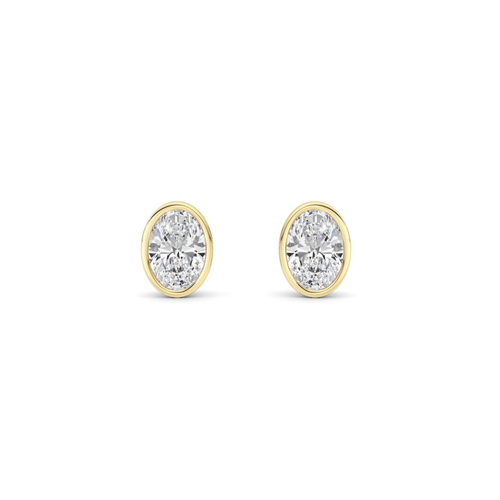 1CTW Oval Shaped Lab Grown Diamond (F/VS) Bezel Set Stud Earrings in 14K Gold