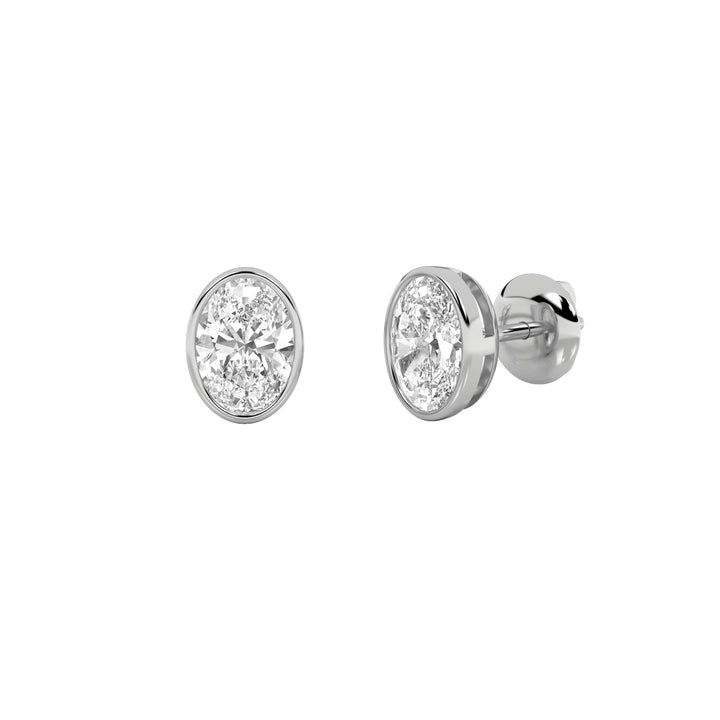 2CTW Oval Shaped Lab Grown Diamond (F/VS) Bezel Set Stud Earrings in 14K Gold