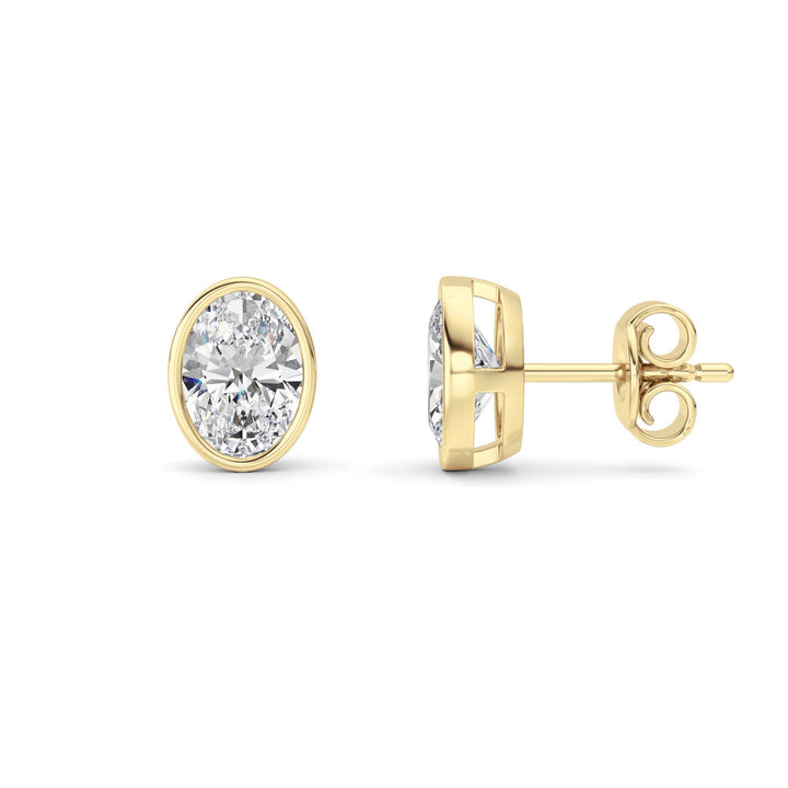 2CTW Oval Shaped Lab Grown Diamond (F/VS) Bezel Set Stud Earrings in 14K Gold