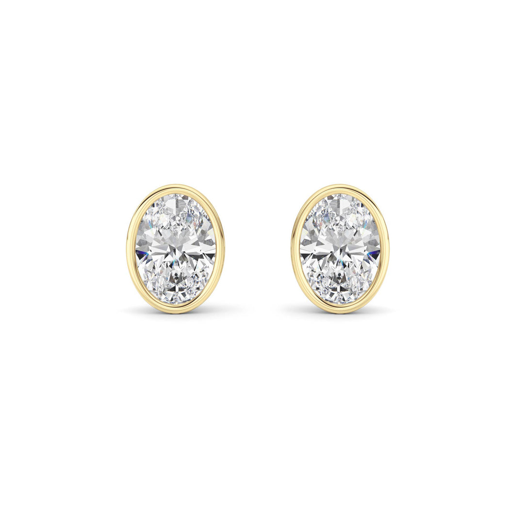 2CTW Oval Shaped Lab Grown Diamond (F/VS) Bezel Set Stud Earrings in 14K Gold