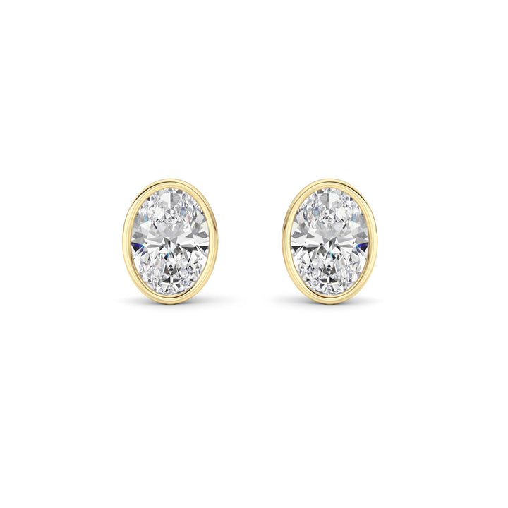 2CTW Oval Shaped Lab Grown Diamond (F/VS) Bezel Set Stud Earrings in 14K Gold