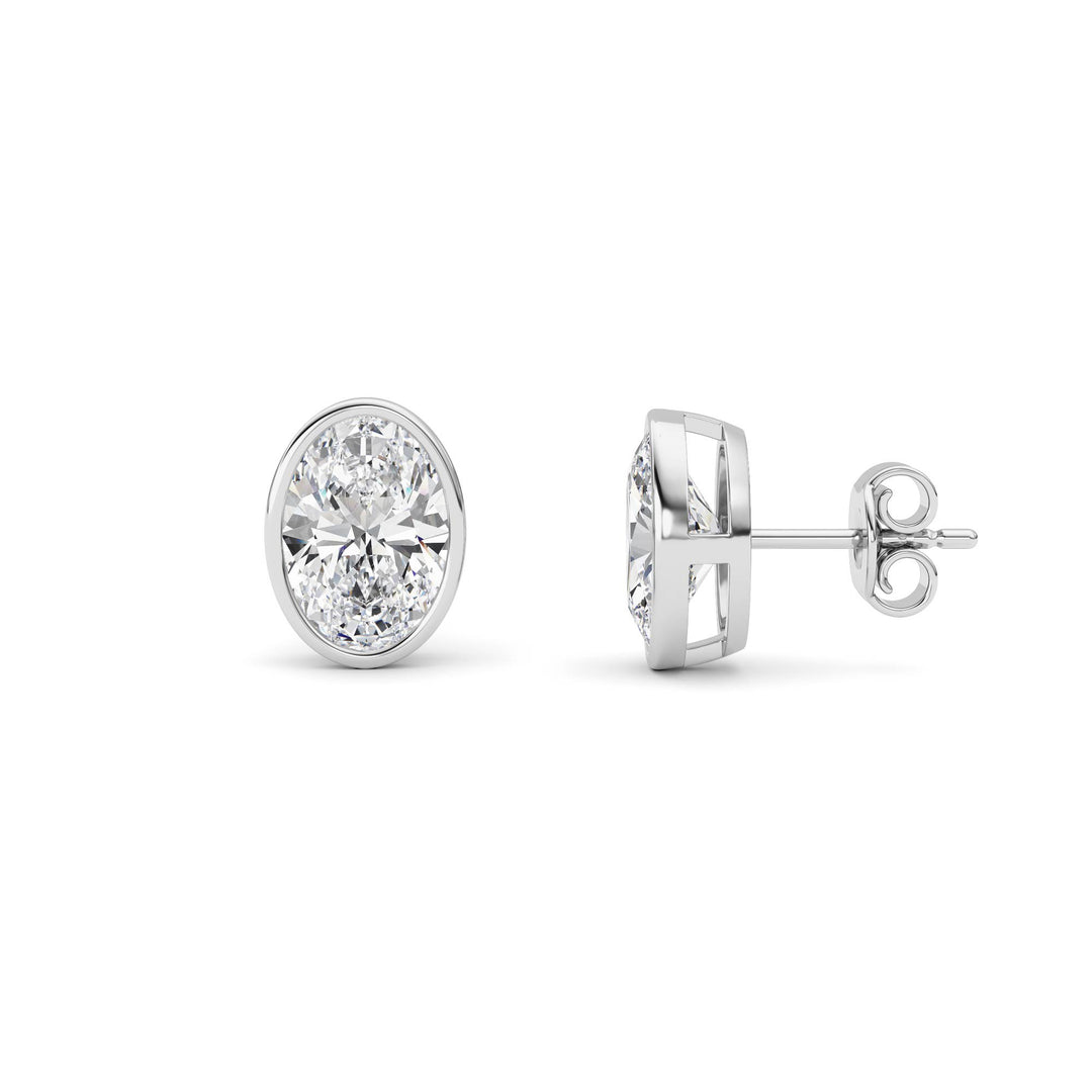 4Cttw Oval Shaped Lab Grown Diamond (F/VS) Bezel Set Stud Earrings in 14K Gold