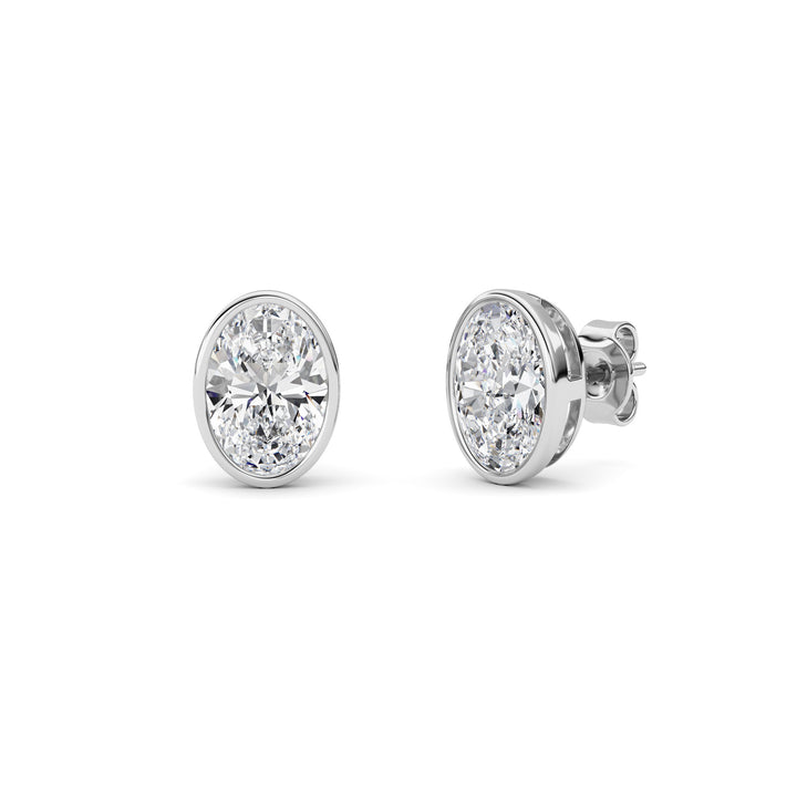 4Cttw Oval Shaped Lab Grown Diamond (F/VS) Bezel Set Stud Earrings in 14K Gold