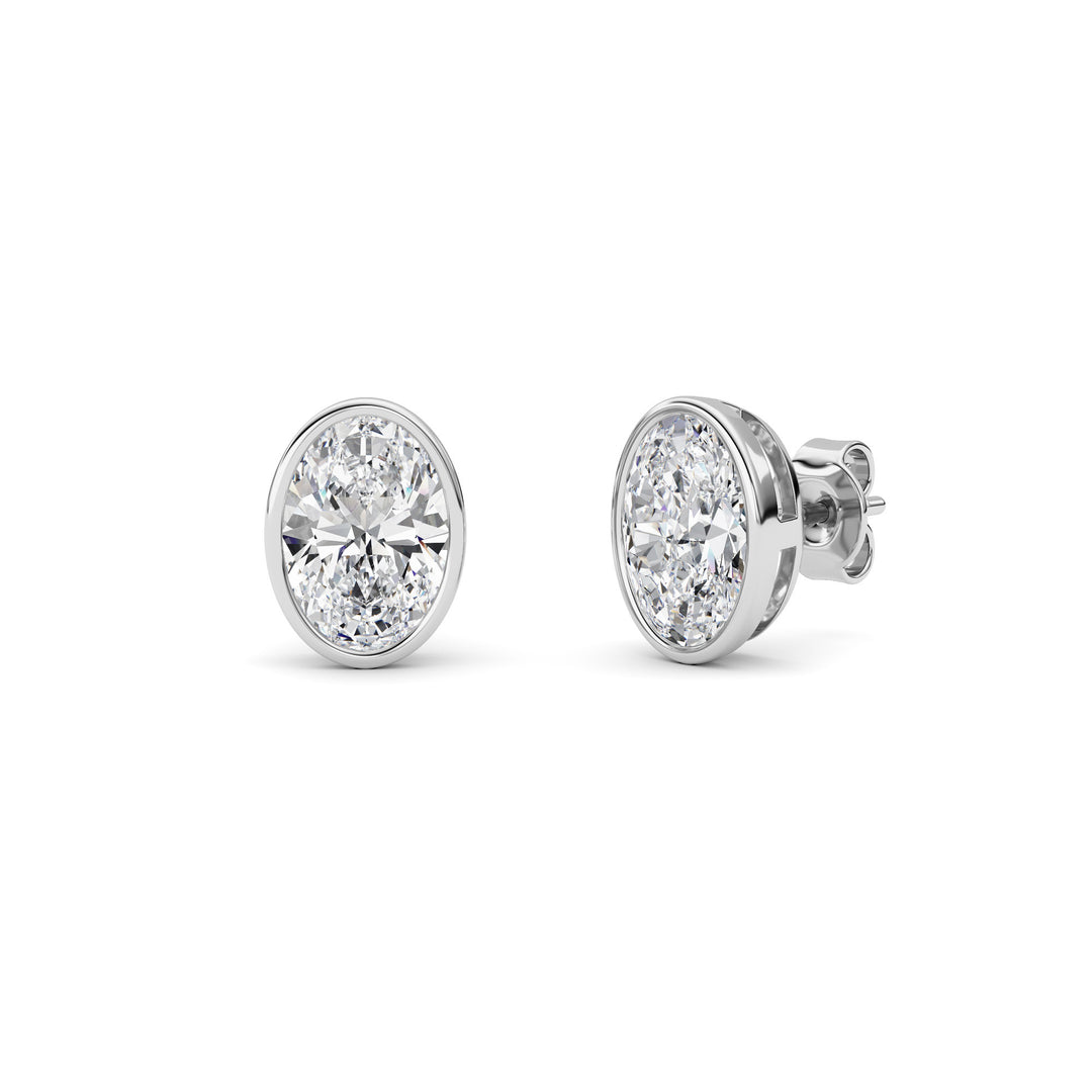 4Cttw Oval Shaped Lab Grown Diamond (F/VS) Bezel Set Stud Earrings in 14K Gold