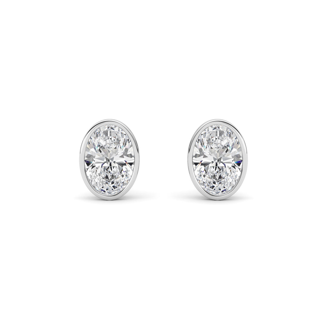 4Cttw Oval Shaped Lab Grown Diamond (F/VS) Bezel Set Stud Earrings in 14K Gold