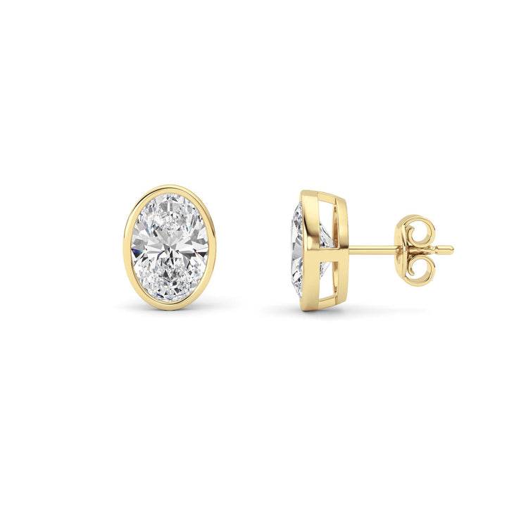 4Cttw Oval Shaped Lab Grown Diamond (F/VS) Bezel Set Stud Earrings in 14K Gold