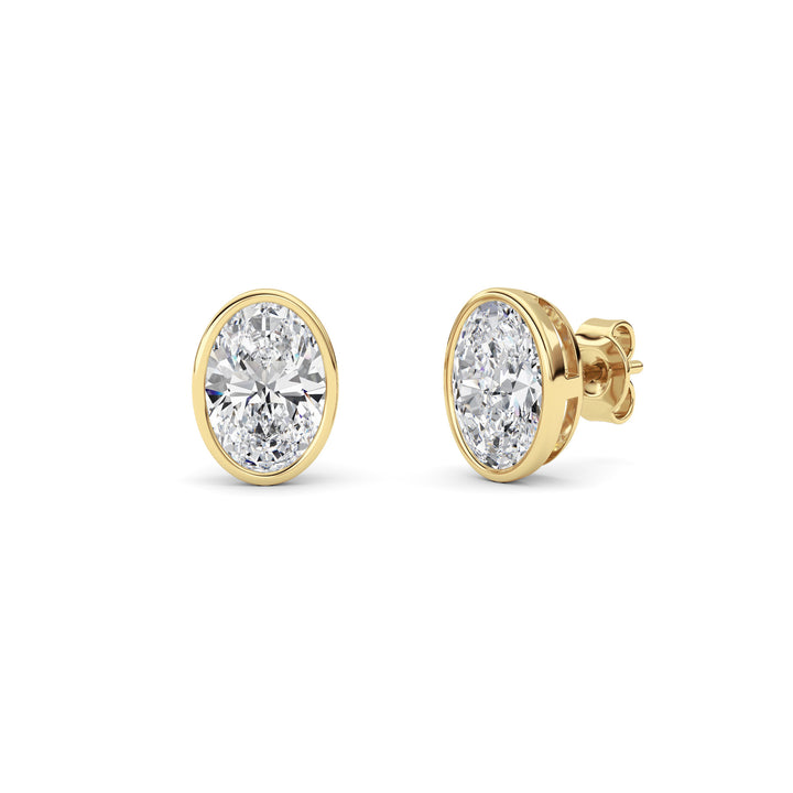 4Cttw Oval Shaped Lab Grown Diamond (F/VS) Bezel Set Stud Earrings in 14K Gold